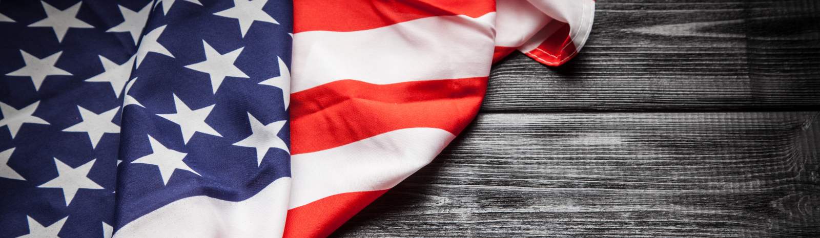 an American flag on wood